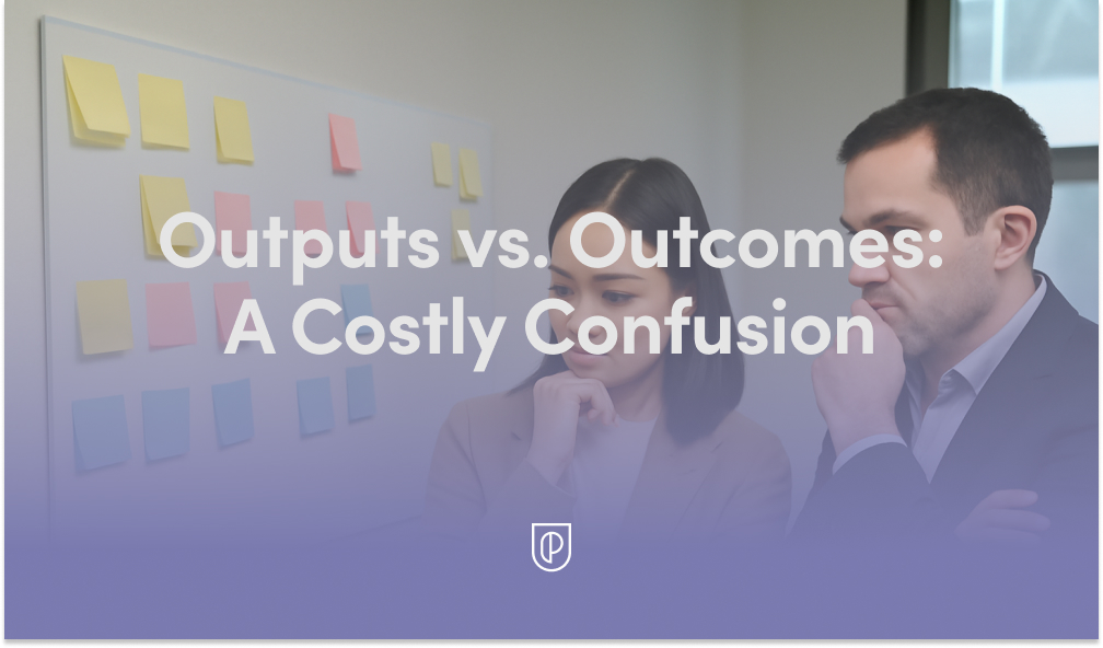 Two office professionals study a board of colorful sticky notes, symbolizing the difference between outputs and outcomes in product strategy, planning, and evidence-based decision-making.